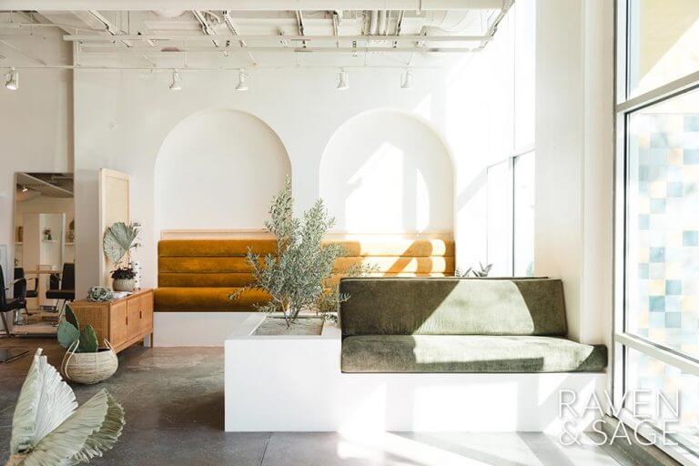 A brightly lit, well-decorated lobby