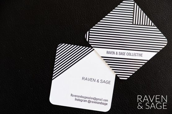 Two stylized Raven & Sage drink coasters